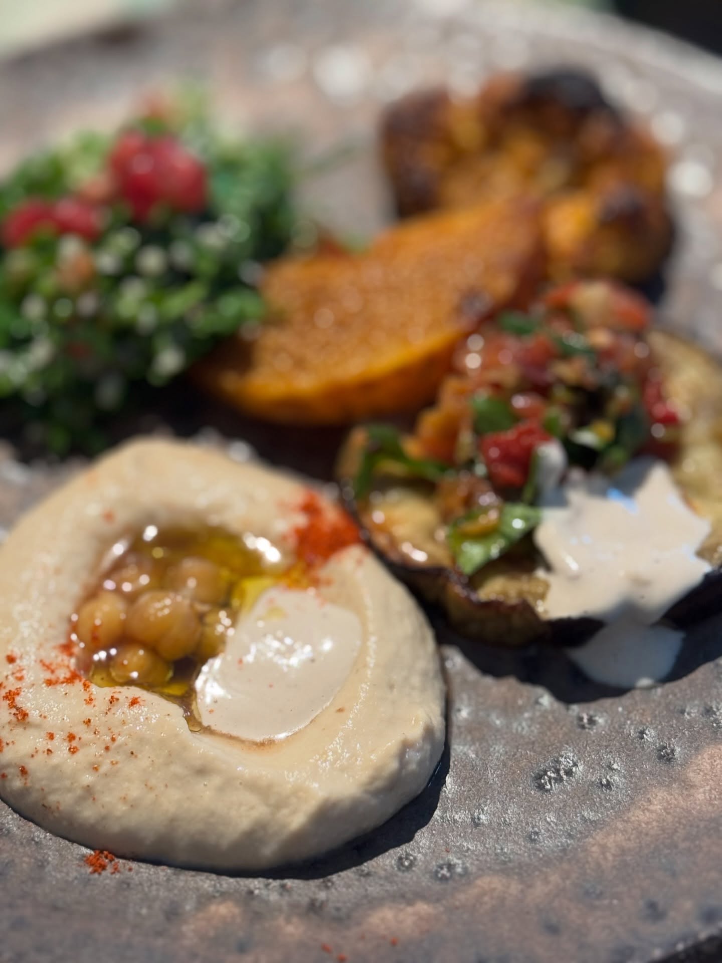 A table full of stories. 🌿

Creamy hummus, roasted pumpkin, smoky aubergine with a bright pepper salsa — and a handful of pomegranate seeds to tie it all together. Every bite a little journey through the Levant.

Handcrafted for your event.

Inquiries via DM or link in bio.

#mezeplate #levantinefood #cateringvienna #hummus #pomegranate vegetarian handmade foodphotography cateringevent joshuascatering